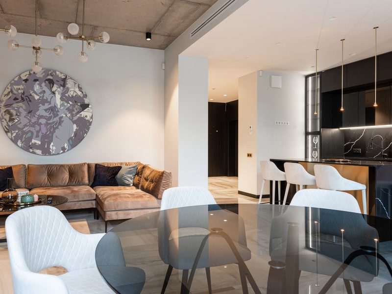 Contemporary condo living space renovation by Nine Yards.